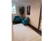 Stylish room featuring two plush blue chairs, contemporary artwork, and bright natural lighting at 21221 Colorado 103, Idaho Springs, CO 80452