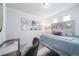 Primary bedroom with light blue bedding at 45032 Sunflower Ln, Bennett, CO 80102