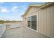 Deck with sliding door access to bedroom at 45032 Sunflower Ln, Bennett, CO 80102