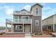 Two-story home with balcony and landscaped yard at 45032 Sunflower Ln, Bennett, CO 80102