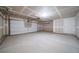 Attached garage with ample space for parking and storage at 45032 Sunflower Ln, Bennett, CO 80102