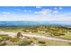 Picturesque lot with scenic views and a private, winding road access at 1232 Berganot Trl, Castle Pines, CO 80108