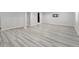 Large basement area with a TV, hard wood floors, egress window, and recessed lighting at 1232 Berganot Trl, Castle Pines, CO 80108
