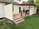 Inviting wooden deck with a pergola, privacy screens, and built in bar for outdoor entertaining at 14642 Williams St, Thornton, CO 80602