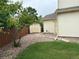 Well maintained backyard with a large shed for outdoor storage, rock features, and newly mowed grass at 14642 Williams St, Thornton, CO 80602