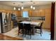 This kitchen features stainless steel appliances, a breakfast bar, and recessed lighting at 14642 Williams St, Thornton, CO 80602