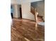 Beautiful home entrance with hardwood floors, staircase, and open layout, perfect for a welcoming space at 14642 Williams St, Thornton, CO 80602
