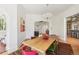 Bright dining room features a modern chandelier and an open-concept design at 3520 Newton St, Denver, CO 80211