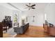 Bright living room with hardwood floors, fireplace, and a classic design at 3520 Newton St, Denver, CO 80211