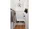 Bright mudroom featuring built-in storage bench with drawers, coat hooks, and modern light fixture at 3520 Newton St, Denver, CO 80211