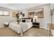Comfortable bedroom with natural light, hardwood floors, and neutral décor at 2290 E Columbia Pl, Denver, CO 80210