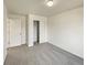 Bedroom with carpet, closet, and door at 4670 Quandary Peak St, Brighton, CO 80601