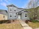 Charming two-story home featuring a well-maintained front yard and a welcoming entrance at 4670 Quandary Peak St, Brighton, CO 80601