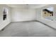 Spacious room with neutral carpeting, abundant natural light, and ample space at 4670 Quandary Peak St, Brighton, CO 80601
