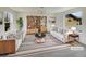 Bright and inviting living room featuring a modern bookcase and stylish decor at 4670 Quandary Peak St, Brighton, CO 80601