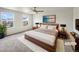 Comfortable bedroom with soft lighting, plush rug, and modern furnishings at 4670 Quandary Peak St, Brighton, CO 80601