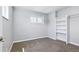 Bedroom with a window and a built in shelving unit at 118 S Yates Way, Denver, CO 80219