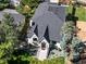 Aerial view of the home showcases landscaping, roof, and charming exterior at 1655 S Marion, Denver, CO 80210