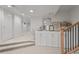 Finished basement with neutral carpeting and built-in storage at 1655 S Marion, Denver, CO 80210