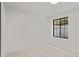 Spacious basement bedroom with large window and carpet at 1655 S Marion, Denver, CO 80210
