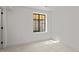 Bright basement bedroom with window and carpet at 1655 S Marion, Denver, CO 80210