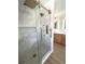 Elegant bathroom with marble shower, soaking tub, and modern fixtures at 1655 S Marion, Denver, CO 80210