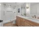 Elegant bathroom with double vanity and walk-in shower at 1655 S Marion, Denver, CO 80210