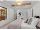Spacious bedroom with large window and neutral decor at 1655 S Marion, Denver, CO 80210