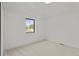 Bright bedroom featuring large window and plush carpeting at 1655 S Marion, Denver, CO 80210