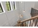 Open staircase with modern railings and unique lighting at 1655 S Marion, Denver, CO 80210