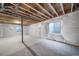 Unfinished basement area with exposed beams and plastic covering at 3987 N Riviera Ct, Aurora, CO 80019