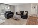 Bright living room with a comfortable seating area and sliding glass doors to the outside at 7040 E Girard Ave # 310, Denver, CO 80224
