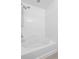Bathroom with a white soaking tub and a shower head at 12798 Ivy St, Thornton, CO 80602