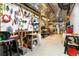 Unfinished basement with tools, a pegboard, and exposed ceiling at 19050 Archers Dr, Monument, CO 80132