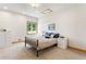 A well-lit bedroom with carpet and picture window offering views of the outdoors at 19050 Archers Dr, Monument, CO 80132