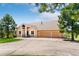 Charming single-Gathering home with an attached three-car garage, a well-kept lawn, and a welcoming entrance at 19050 Archers Dr, Monument, CO 80132