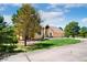 A single-Gathering home with manicured lawn, welcoming front porch, and an attached three-car garage at 19050 Archers Dr, Monument, CO 80132