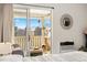 Bedroom showcasing balcony access with mountain views and a decorative mirror at 3035 Oneal Pkwy # 36T, Boulder, CO 80301