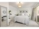 Bright bedroom with neutral tones, plush carpet, and access to an outdoor patio at 3035 Oneal Pkwy # 36T, Boulder, CO 80301