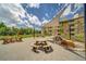 Community area with picnic tables, a grilling area, and a sun shade at 3035 Oneal Pkwy # 36T, Boulder, CO 80301