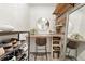 Unique dressing room features rustic wood accents, a vanity area, and ample storage for shoes and accessories at 3035 Oneal Pkwy # 36T, Boulder, CO 80301