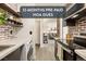 Kitchen features brick walls, marble countertops, and modern appliances, including a washer/dryer at 3035 Oneal Pkwy # 36T, Boulder, CO 80301