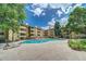 Community pool surrounded by sun loungers and mature trees at 3035 Oneal Pkwy # 36T, Boulder, CO 80301