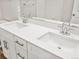 Contemporary bathroom features a double vanity with elegant fixtures and ample counter space for a luxurious feel at 22435 E 7Th Pl, Aurora, CO 80018