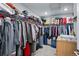 Organized walk-in closet with ample storage space and shelving at 8470 Arriba Dr, Littleton, CO 80125