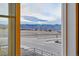 Scenic view of mountains and open space from inside the home at 8470 Arriba Dr, Littleton, CO 80125