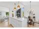 Modern kitchen with white shaker cabinets and quartz countertops at 805 Sparta Dr, Lafayette, CO 80026