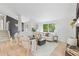 Open concept living room with fireplace and large windows at 805 Sparta Dr, Lafayette, CO 80026