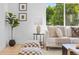 Cozy living room with neutral decor and ample natural light at 805 Sparta Dr, Lafayette, CO 80026