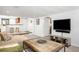 Finished basement featuring a bar area, TV, and cozy seating area at 628 Cherry St, Denver, CO 80220